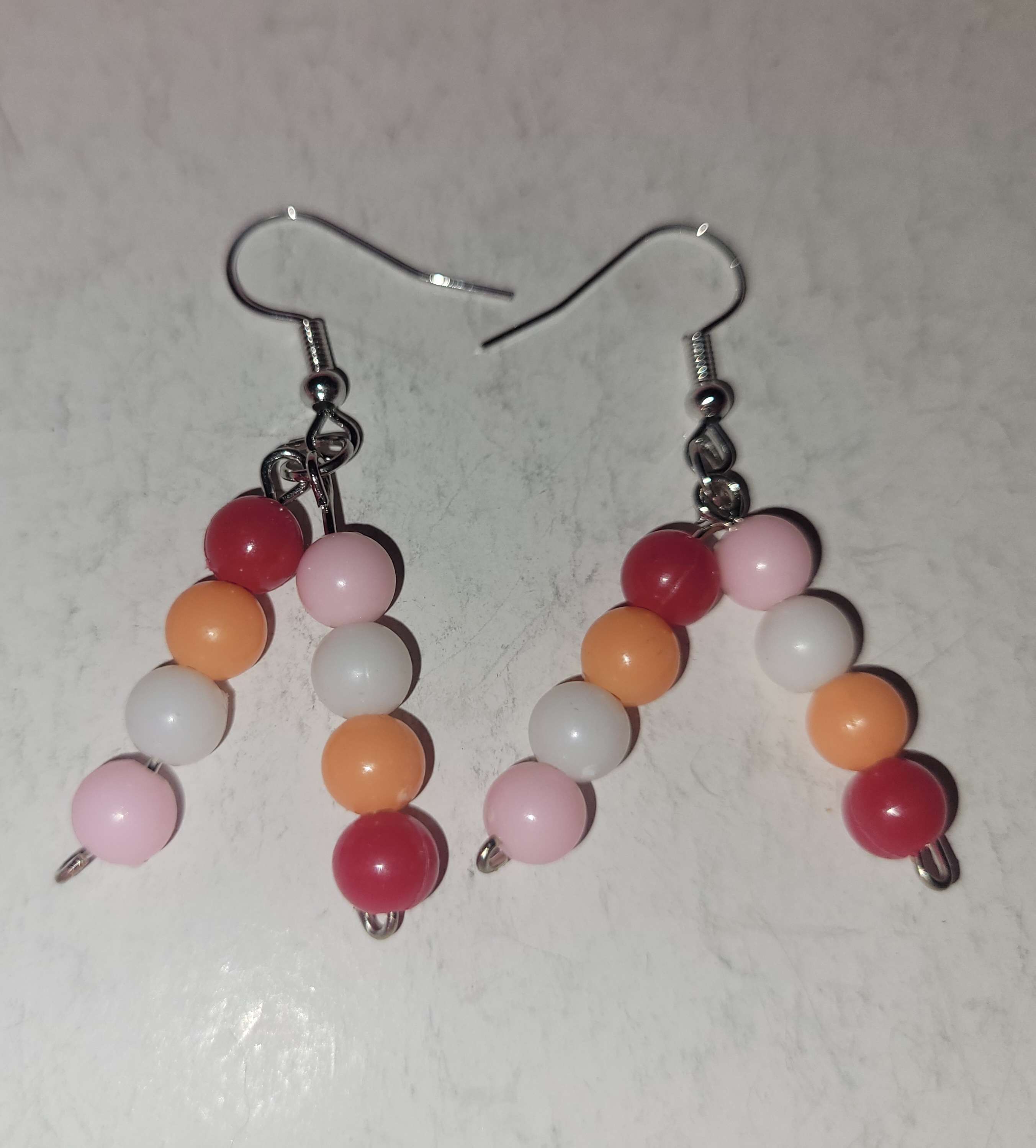 Earrings made with sunset flag colors