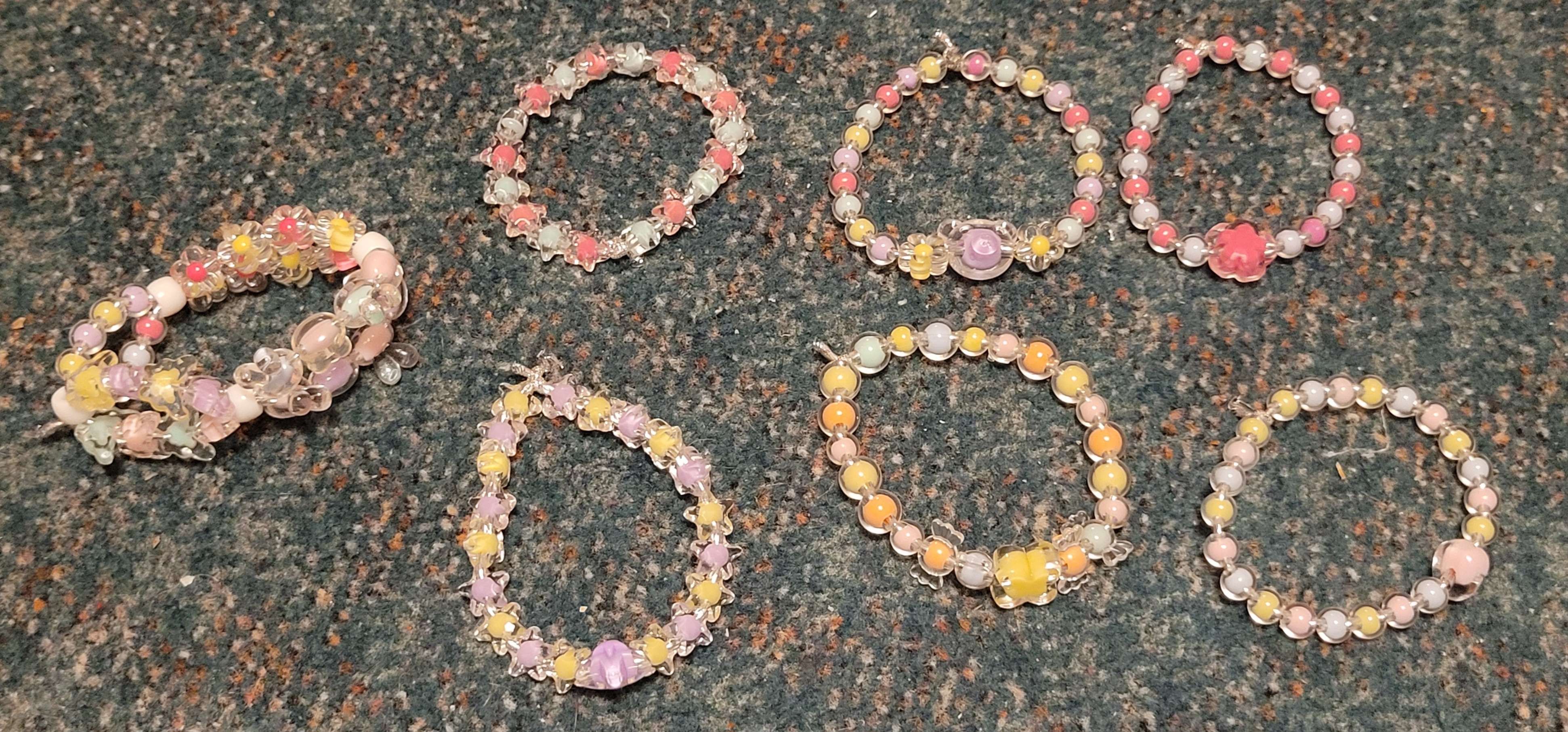 Beaded bracelets made with colorful pastel beads.