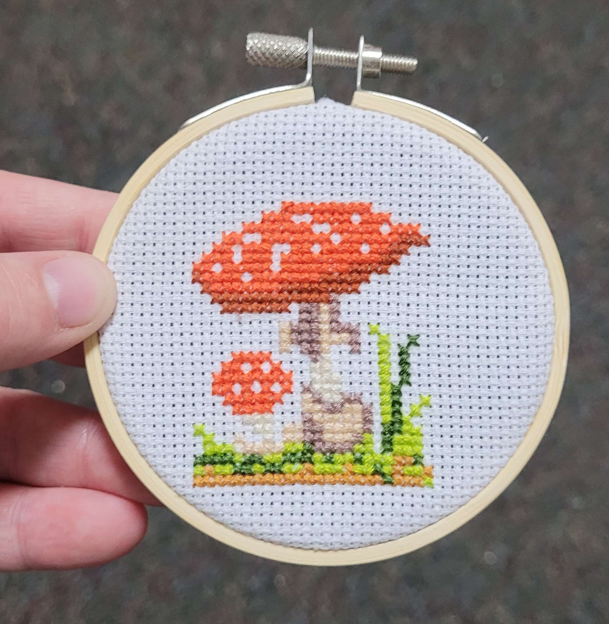 Cross stitch of a fly agaric mushroom